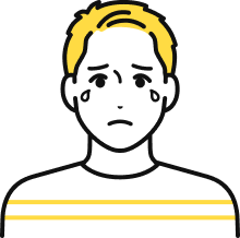 泣いている表情のTさん